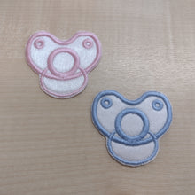 Motif Patch Baby Dummy Front View