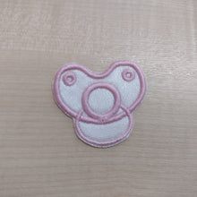 Motif Patch Baby Dummy Front View
