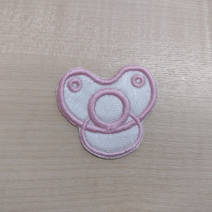 Motif Patch Baby Dummy Front View