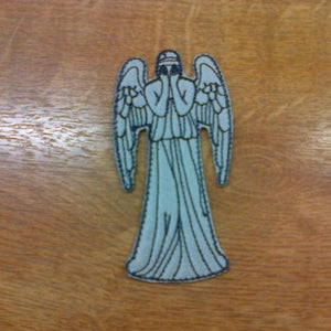 Motif Patch Crying Angel Statue
